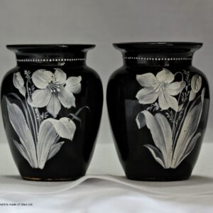 Pair of small enamelled black glass vases attributed to Harrach
