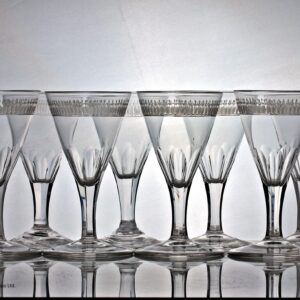 Set of eight Georgian facet cut stem engraved wine glasses