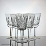 Set of six Waterford Crystal Lismore pattern white wine glasses