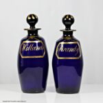 Georgian pair of Bristol blue barrel shaped decanters