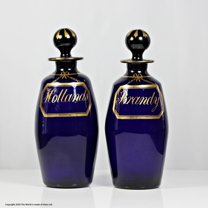 Georgian pair of Bristol blue barrel shaped decanters