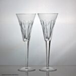 Pair of Waterford Crystal Millennium pattern champagne flutes, Love pattern