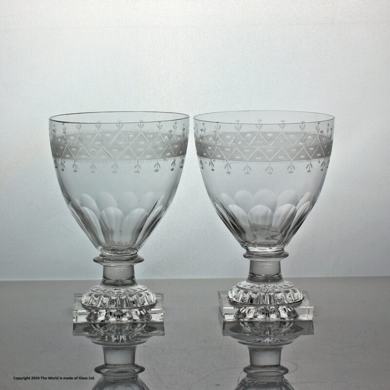 Georgian-style pair of engraved ovoid bowl rummers, lemon squeezer feet