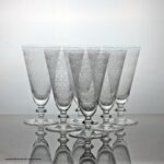 Set of six Baccarat Rohan pattern champagne flutes