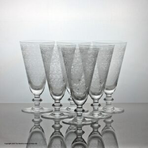 Set of six Baccarat Rohan pattern champagne flutes