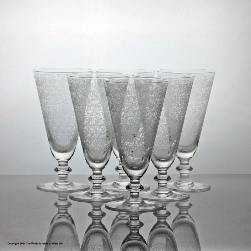 Set of six Baccarat Rohan pattern champagne flutes