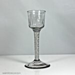 Georgian double series opaque twist wine glass, flute-moulded ogee bowl