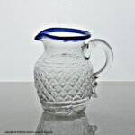 Georgian small mould-blown cream jug with blue glass rim