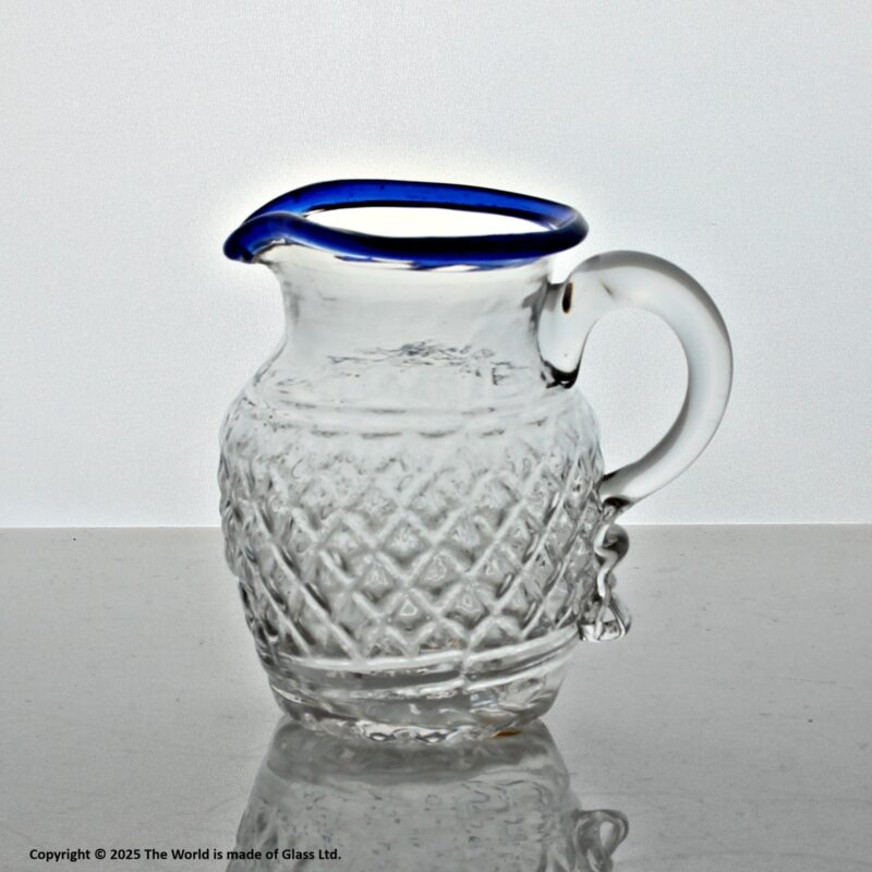 Georgian small mould-blown cream jug with blue glass rim
