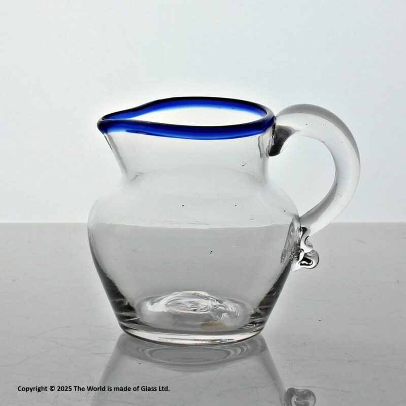 Georgian small plain bowl cream jug with blue glass rim