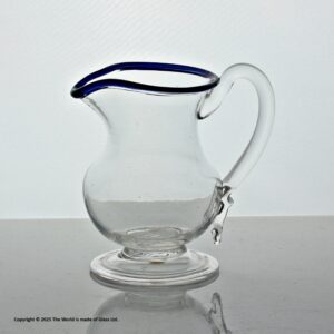 Georgian plain bowl cream jug with blue glass rim, folded foot