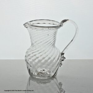 Georgian wrythen-moulded clear glass cream jug