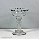 Georgian multi spiral opaque twist sweetmeat glass, dog tooth rim