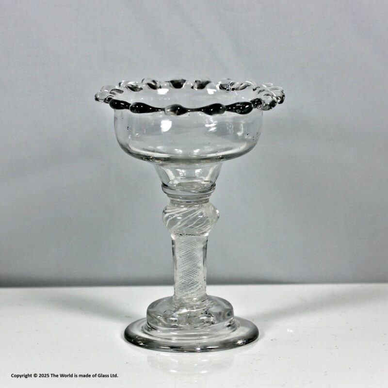 Georgian multi spiral opaque twist sweetmeat glass, dog tooth rim