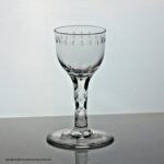 Georgian facet cut stem wine glass, OXO engraved bowl