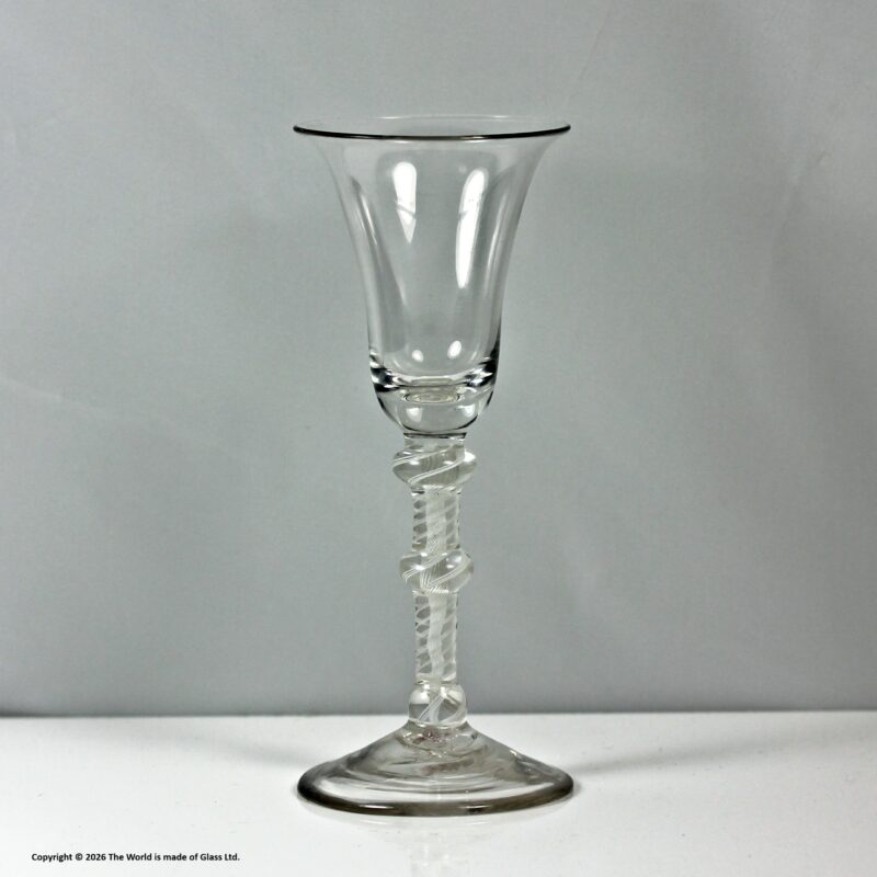 Georgian scarce double series opaque twist wine glass, triple knop