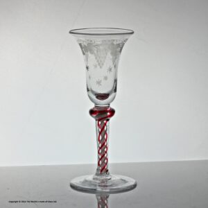 Georgian, Continental, ruby colour twist stem wine glass, vine-engraved bowl