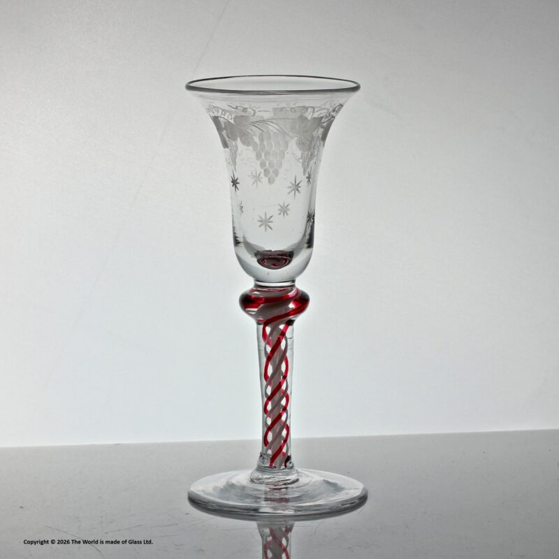 Georgian, Continental, ruby colour twist stem wine glass, vine-engraved bowl