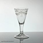 Georgian swag and tail engraved dram or gin glass
