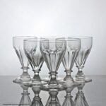Matched set of six Victorian mouth-blown, petal flute-cut dram glasses