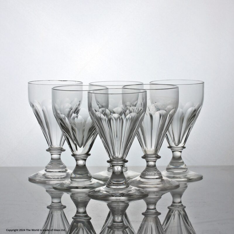 Matched set of six Victorian mouth-blown, petal flute-cut dram glasses