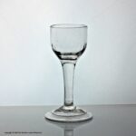 Georgian, English plain stem wine glass, flute-moulded ovoid bowl