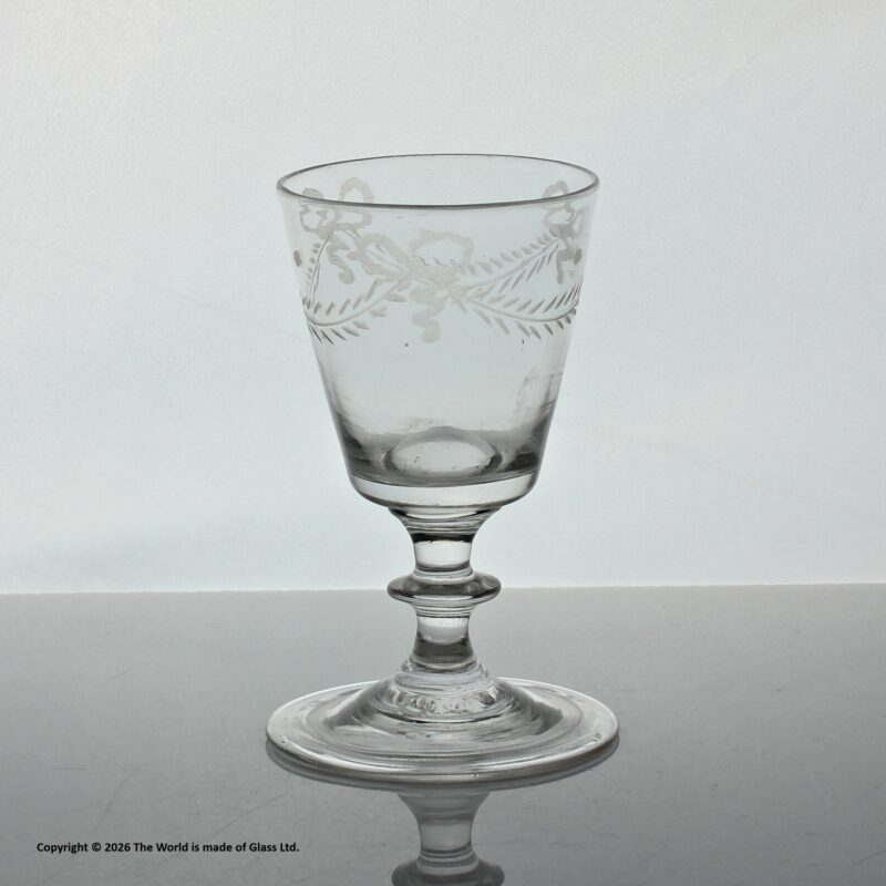Georgian swag and tail engraved bucket bowl dram glass with folded foot