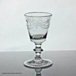 Georgian swag and tail engraved bucket bowl dram glass with folded foot