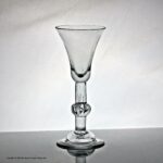 Georgian baluster wine glass, medial air tear knop, bell bowl